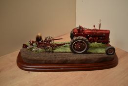 A Border Fine Arts figure group 'Making Adjustments' model number A2142 designed by Ray Ayres.