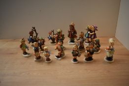 A selection of fifteen Goebel porcelain figures and figurines to include 'Little Gardener' model