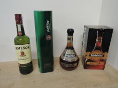 Irish Whiskey & Liqueur, Jameson Triple Distilled, bottle number JQ058548, 40% vol, 700ml, in tin