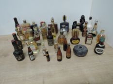 Alcoholic Miniatures including, Vat 69 Whisky 70 proof x2, Dimple 12 Year 40%, Dimple 70 proof,