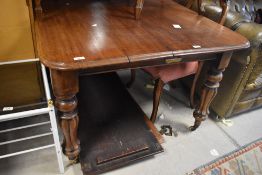 A Victorian mahogany extending dining table (no winder)