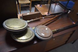 Three traditional warming pans