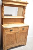 A rustic stripped pine mirror back sideboard, width approx. 104cm