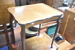 A vintage occasional table (part nest)