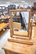 A pine dressing table mirror