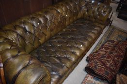 A traditional Chesterfield 3 seater settee in green leather, approx. 200cm