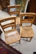 Ten traditional chapel chairs and a similar railback chair