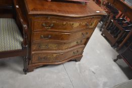 A reproduction Regency style serpentine fronted dwarf chest , width approx. 71cm