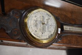 An early 20th Century aneroid barometer, dial named for Harry Hall (glass broken)