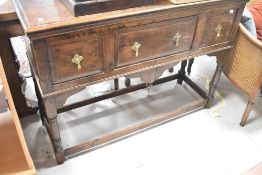 A traditional oak dresser base in the period style, width approx. 116cm