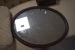 A stained frame wall mirror of oval form (ex dressing table)