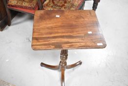 A Victorian mahogany occasional table having fluted column and triple splay legs, width approx.