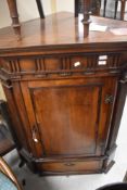 A Georgian mahogany corner cupboard, height approx. 124cm