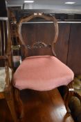 A Victorian mahogany balloon back salon chair