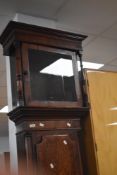 A 19th Century oak and mahogany long cased clock , having 8 day movement, with painted dial ,