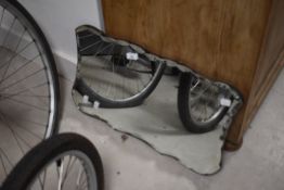 A vintage frameless wall mirror, width approx. 60cm