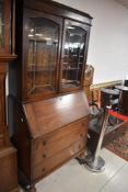An early 20th Century oak bureau bookcase, height approx. 191cm
