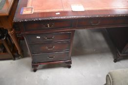 A reproduction Regency pedestal desk, approx. width 153cm
