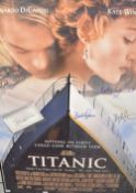 A framed and signed Titanic movie poster, signed by Kate Winslett, Leonardo DiCaprio, Billy Zane and