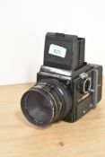 Bronica SQ-A with 80mm f2.8 lens and 120 film back. Including original instruction booklet.