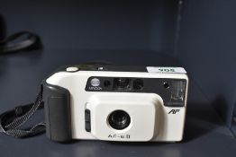 Minolta AF-E II 35mm compact point-and-shoot camera, in white.