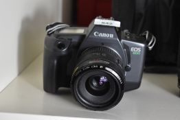 Canon EOS 600 35mm camera with various lenses and accessories. A Canon EF 35-70mm f3.5-4.5, a