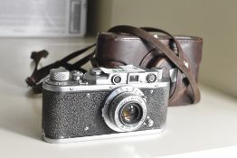 Zorki 1 Soviet 35mm rangefinder, with a collapsible Industar-22 50mm f3.5 lens.