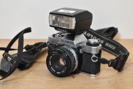 Olympus OM20 35mm film camera with an Olympus Zuiko 50mm f1.8 lens and an Olympus T20 electronic