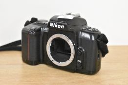Nikon F601 35mm film camera.