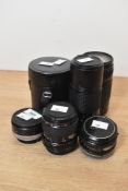 Collection of Canon lenses - a Canon FD 200mm f4, a Canon EF 75-300mm f4-5.6, a Canon 50mm f1.8, a