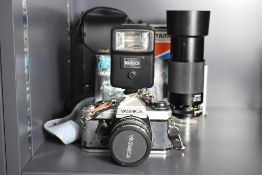 A Yashica FX-D Quartz camer with Instruction booklet, Yashica CS201 Flash having Yashica ML 1:2 50mm