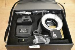 A Sunpak auto DX-8R Ring Light boxed as new.