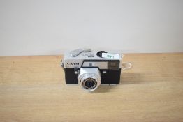 A Canon C30 Canpomatic with Canon lens 1:3,5 40mm.