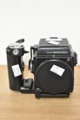 Bronica SQ-A camera body plus various Bronica accessories including a speed grip. *camera body is