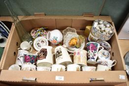 A collection of assorted commemorative mugs, two advertising jugs Old Highland and Old Scotch Whi