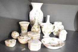 A large Aynsley Wild Tudor vase and another small vase in the same pattern sold along with nine