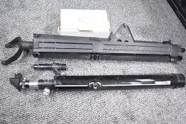 A tri-pod camera stand, sold alongside 1 other