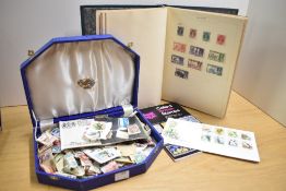 A partially completed simplex Blank stamp album and selection of loose stamps