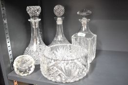A group of crystal glass decanters sold together with a bowl and candle holder, (5)