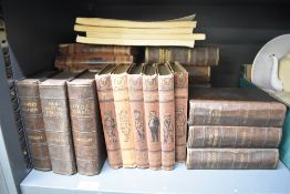 A selection of vintage books including Odhams Press Dickens and Punch library of humour