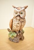 A ceramic painted Grafenthal Owl study perched on a tree stump, measuring 26cm tall.