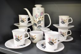 A 1960's J & G Meakin Studio coffee set, comprising coffee pot, six cups and saucers, sugar & cream,