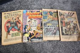A mid-century American Wonder Woman comic, sold together with an Avengers comic, a Daredevil comic