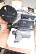A Halina Super Eight video camera sold with a Hanimex 808D Movie Projector.