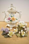 A Napoleon ceramic tea pot with cover, decorated with floral patterns, having shaped spout and