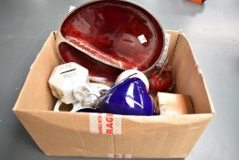 A decorative serving platter having painted red interior sold alongside two bone china money boxes