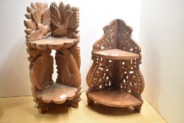 A small decorative carved oak two-tier corner shelf, carved with foliage and birds 47cm sold along