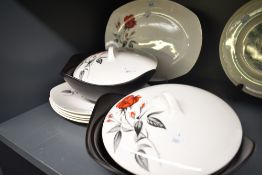 A pair of Midwinter 'Carmen' pattern tureens with covers, w25cm, sold together with 4 plates and 1