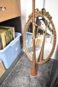 A 20th century copper and brass hunting horn, L120cm in damaged condition