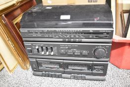 A Panasonic SG-HM09L Compact Audio System featuring a turntable, a dual cassette deck and an AM/FM